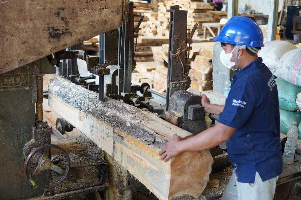 Sawmill wood logs being processed at MPP Furniture factory in Cirebon